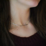 silver sideways cross necklace